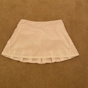 white ivivva tennis skirt